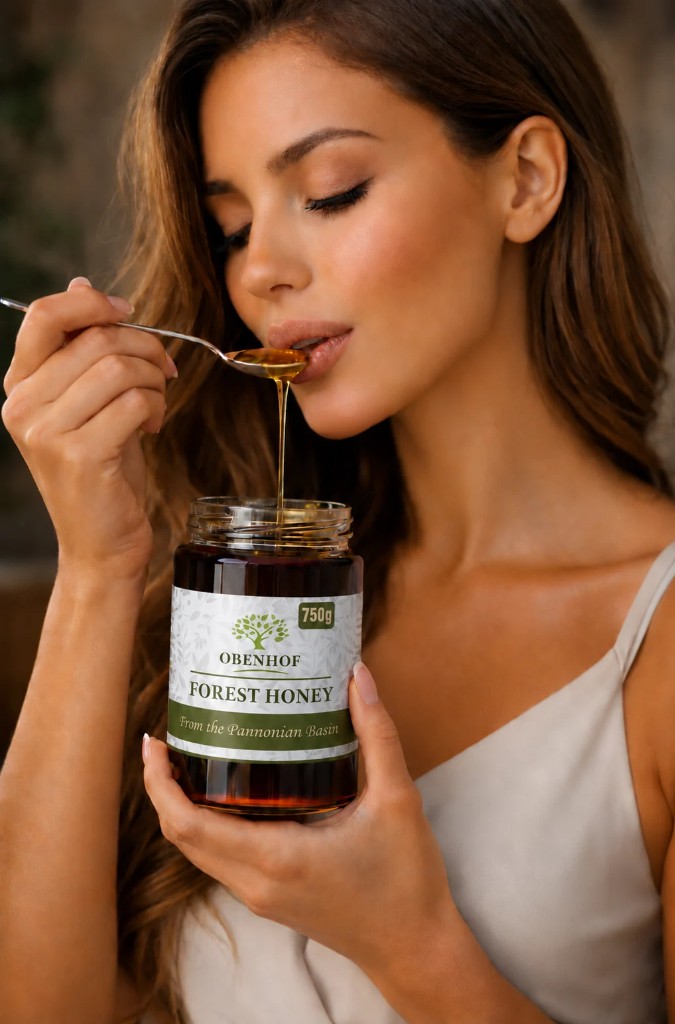 A lady is tasting forest honey from the honey supplier Obenhof